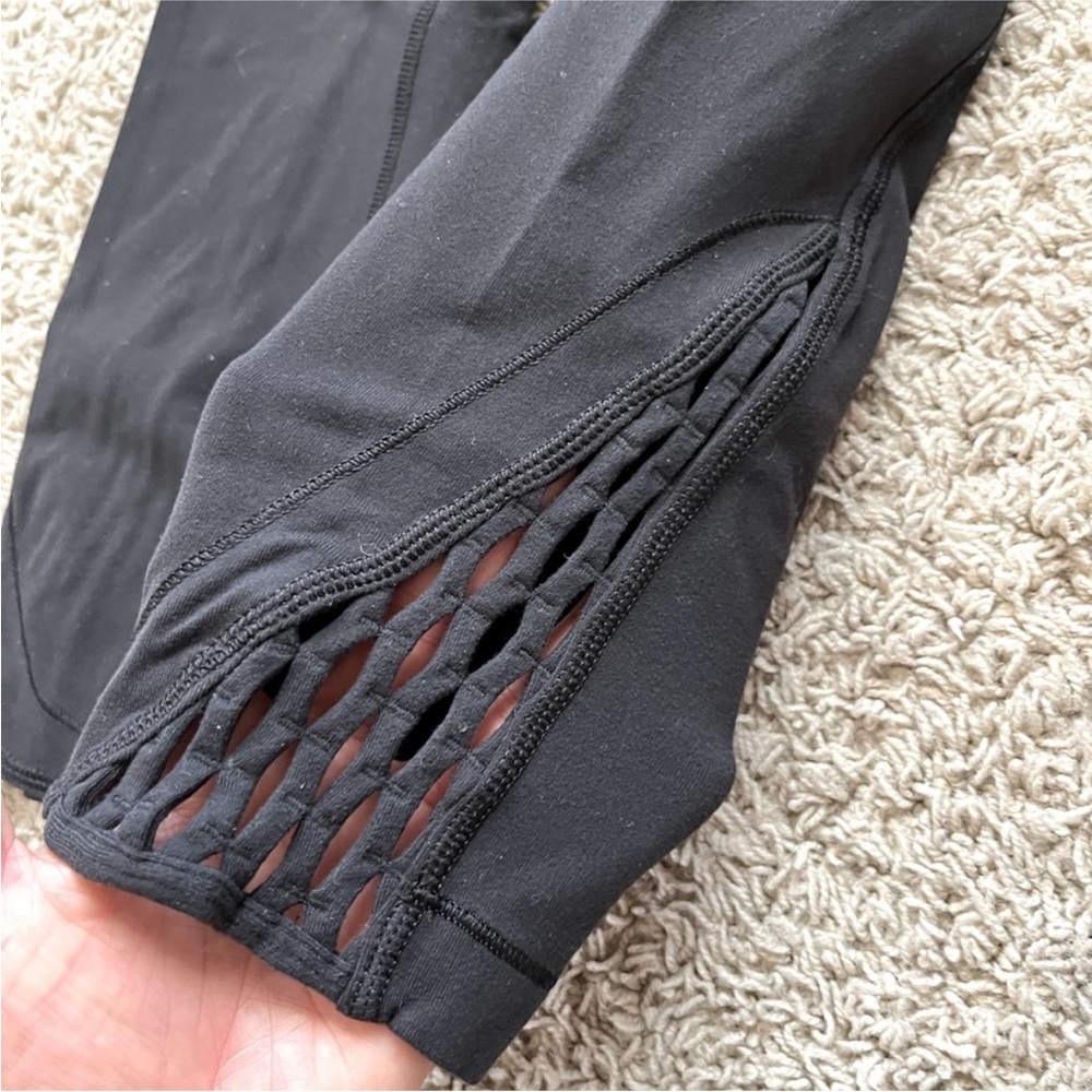 Lululemon black crop leggings with cut-outs 21” inseam